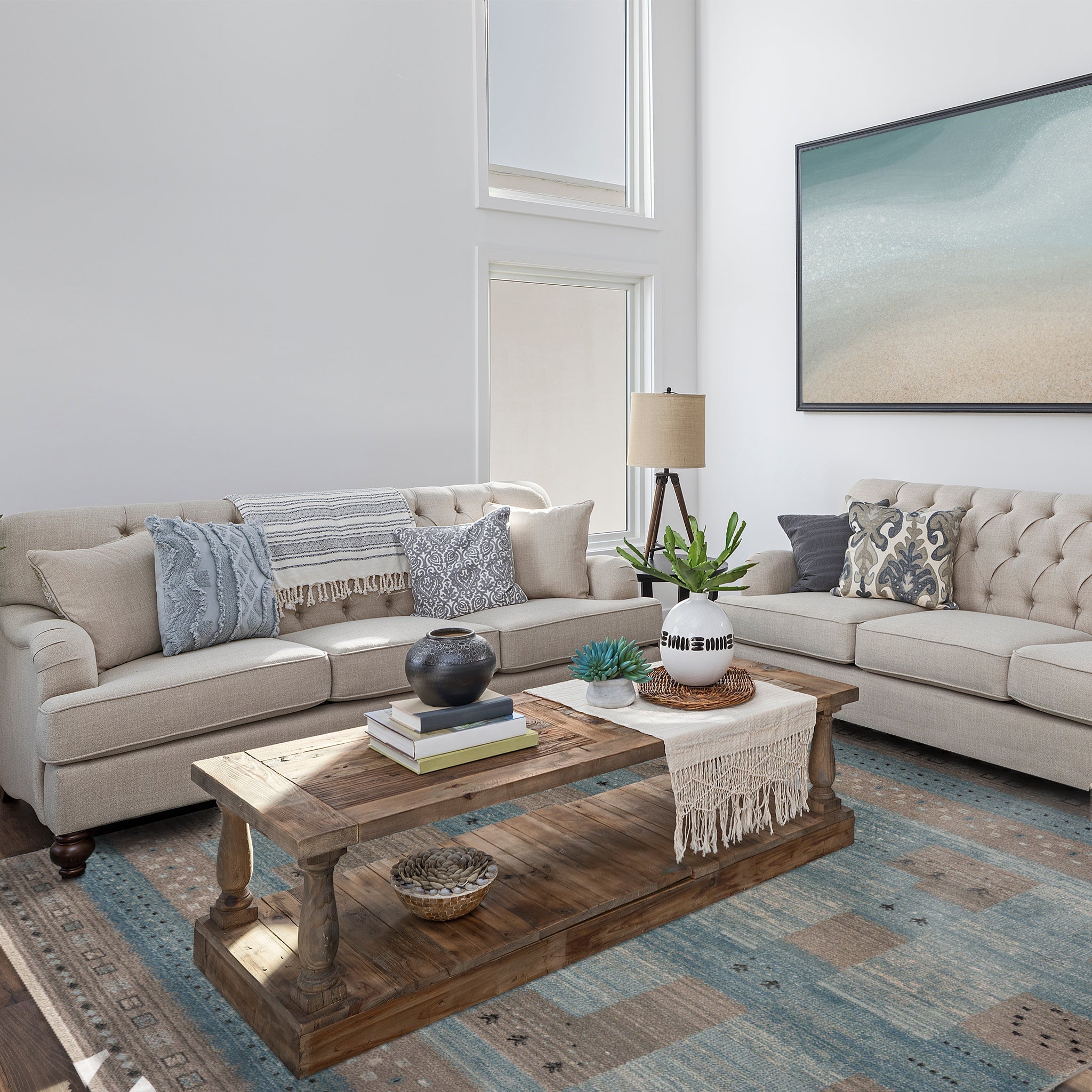 Modern living room with Bodrum Area Rug, beige sofas, wooden coffee table